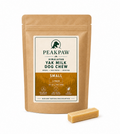 A stand-up kraft paper pouch of PeakPaw Himalayan Yak Milk Dog Chew in Small size, shown on a white background with one chew cube placed in front.

